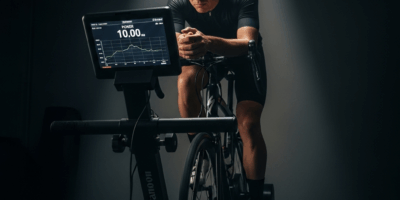 cyclist on indoor trainer looking frustrated at screen showi 20260331 082043